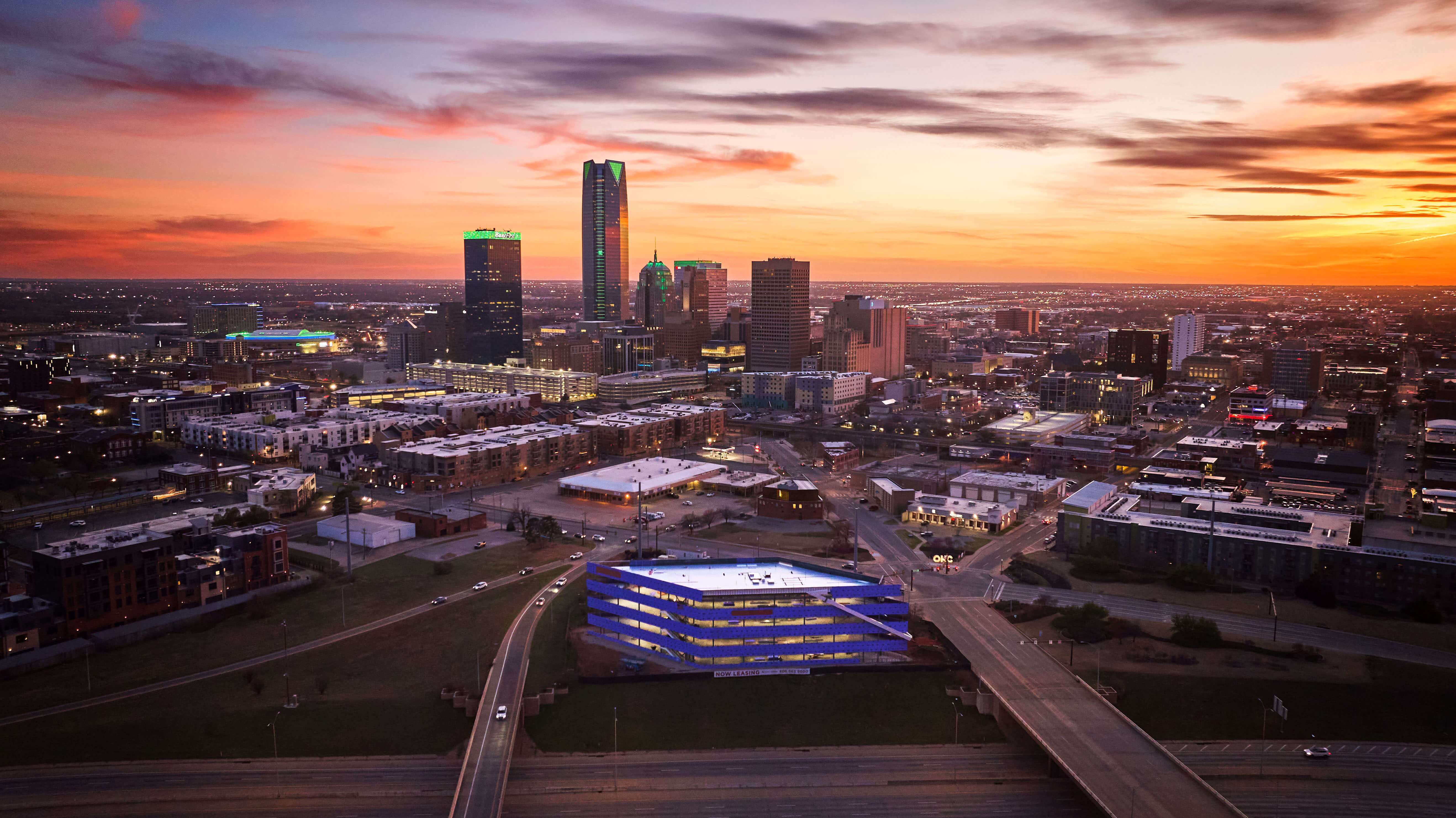 Aerial view of Berry Rock Building steel structure rising at 616 N. Walnut Ave at sunset, March 2026